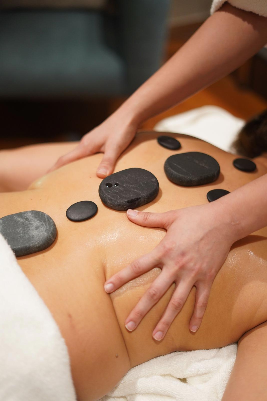 Sea salt hot stone massage at Luxe Luminary Spa in Los Angeles