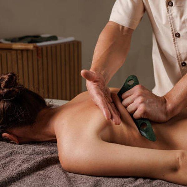 Jade gua sha back treatment in Los Angeles