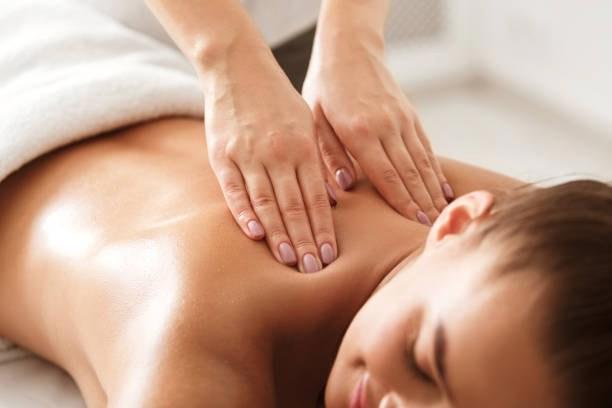 Shoulder and back massage during a body spa treatment in Los Angeles